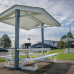 Northwest Marine Yacht Club umbrella bench tables